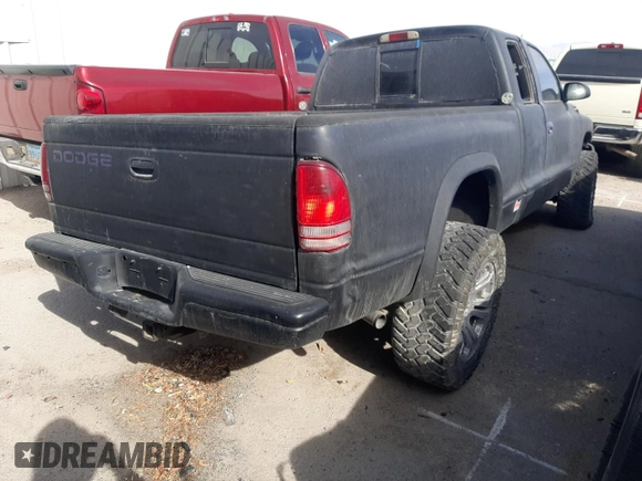 2000 Dodge Dakota SLT with VIN 1B7GG22X1YS655459, listed as a Copart auction lot 84569564 with 240,478 mi miles and Non Repairable. Bid and sale history available at DreamBid. Image 3.