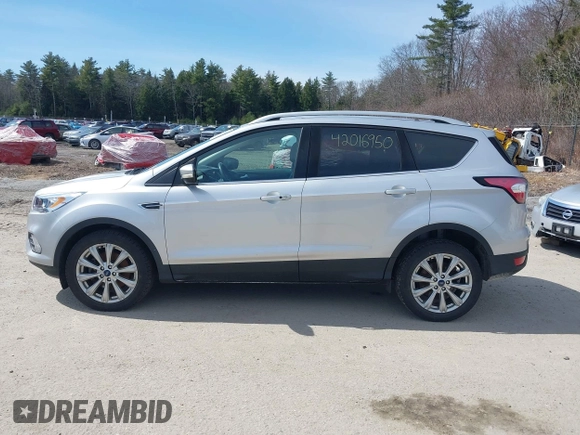 2017 Ford Escape Titanium with VIN 1FMCU9JD3HUE03686, listed as a IAAI auction lot 42016950 with 82,299 mi miles. Bid and sale history available at carsss.com. Image 14.