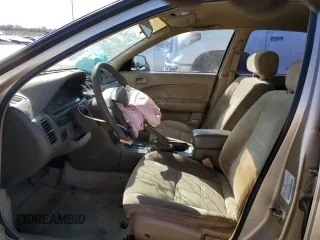 1998 Nissan Maxima GXE with VIN JN1CA21D0WM903051, listed as a Copart auction lot 47821445 with 156,748 mi miles and Salvage title. Bid and sale history available at DreamBid. Image 7.