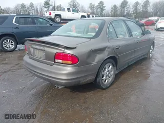 2000 Oldsmobile Intrigue GLS with VIN 1G3WX52H9YF131166, listed as a IAAI auction lot 41527895 with 104,534 mi miles. Bid and sale history available at carsss.com. Image 4.