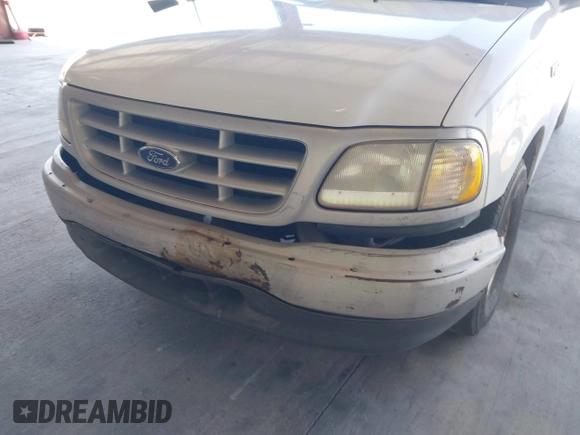 1999 Ford F-150 with VIN 1FTZF1721XKB63483, listed as a IAAI auction lot 42327278 with Not provided miles and . Bid and sale history available at DreamBid. Image 6.