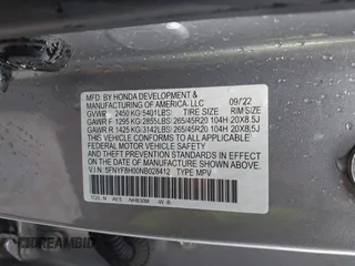 2022 Honda Passport Elite with VIN 5FNYF8H00NB028412, listed as a IAAI auction lot 41962853 with 128,230 mi miles. Bid and sale history available at carsss.com. Image 9.