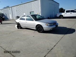 1998 Ford Contour z VIN 3FAFP66L8WM142974, wystawiony jako Copart lot #42175265 z przebiegiem 195 277 mil mil oraz Szkoda całkowita • Salvage title. Historia ofert i sprzedaży dostępna na DreamBid. Obrazek 11.