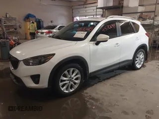 2013 Mazda CX-5 Grand Touring with VIN JM3KE4DE8D0147851, listed as a IAAI auction lot 41570695 with 94,648 mi miles. Bid and sale history available at carsss.com. Image 17.