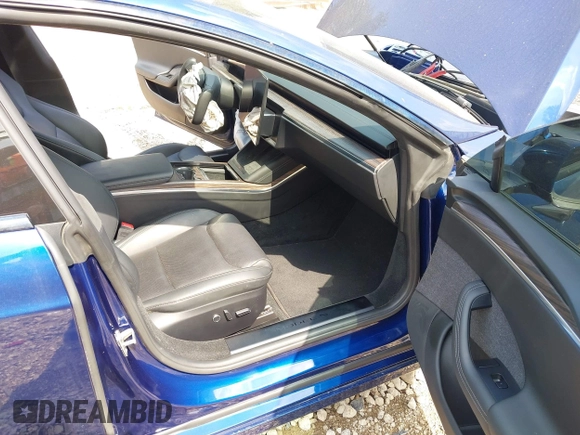 2022 Tesla Model S with VIN 5YJSA1E55NF486443, listed as a IAAI auction lot 42720110 with Not provided miles and . Bid and sale history available at DreamBid. Image 5.