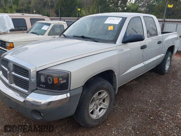 2005 Dodge Dakota SLT with VIN 1D7HE48K25S232893, listed as a IAAI auction lot 41932773 with 209,459 mi miles and . Bid and sale history available at DreamBid. Image 2.