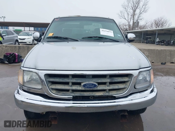 2001 Ford F-150 XL с VIN 1FTRX17L21NA88319, выставлен на аукционе IAAI как лот 41476671 с пробегом Не указан миль и . История ставок и продаж доступна на DreamBid. Изображение 13.