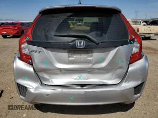2016 Honda Fit LX z VIN JHMGK5H53GX009541, wystawiony jako Copart lot #56158035 z przebiegiem 260 565 mil mil oraz Szkody całkowita. Historia ofert i sprzedaży dostępna na DreamBid. Obrazek 6.