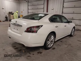 2014 Nissan Maxima S with VIN 1N4AA5AP1EC439827, listed as a IAAI auction lot 41847464 with 135,205 mi miles and . Bid and sale history available at DreamBid. Image 4.