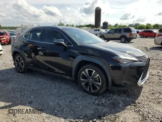 2021 Lexus UX 250h with VIN JTHX9JBH2M2049657, listed as a Copart auction lot 58744945 with 36,054 mi miles and Salvage title. Bid and sale history available at DreamBid. Image 4.