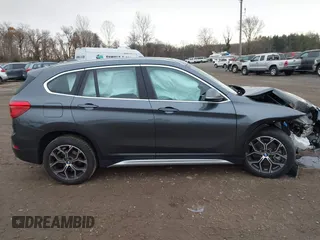 2021 BMW X1 xDrive28i with VIN WBXJG9C06M5S05303, listed as a IAAI auction lot 41060130 with 29,644 mi miles. Bid and sale history available at carsss.com. Image 14.