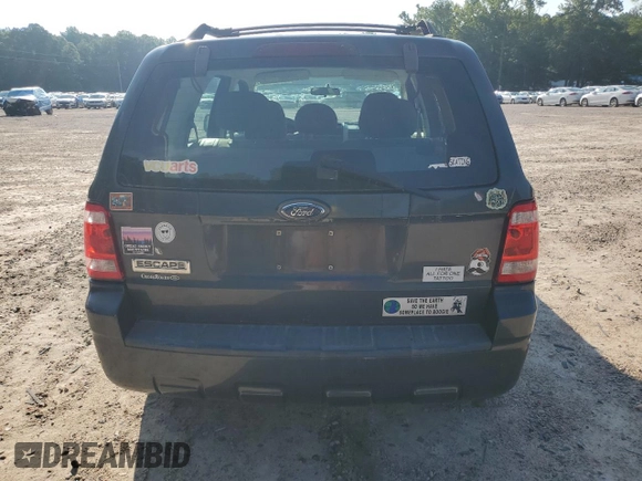2009 Ford Escape XLS with VIN 1FMCU02739KD07929, listed as a Copart auction lot 64861745 with 144,914 mi miles and Clean title. Bid and sale history available at DreamBid. Image 6.