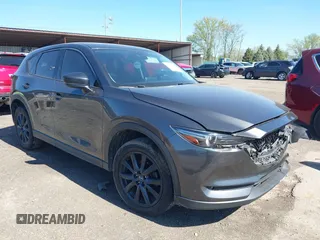 2017 Mazda CX-5 Grand Touring with VIN JM3KFBDLXH0225634, listed as a IAAI auction lot 42092029 with 86,373 mi miles and . Bid and sale history available at carsss.com. Image 1.