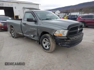 2012 Ram 1500 Tradesman with VIN 3C6JD7DT5CG174871, listed as a IAAI auction lot 41469187 with 56,910 mi miles and . Bid and sale history available at DreamBid. Image 1.