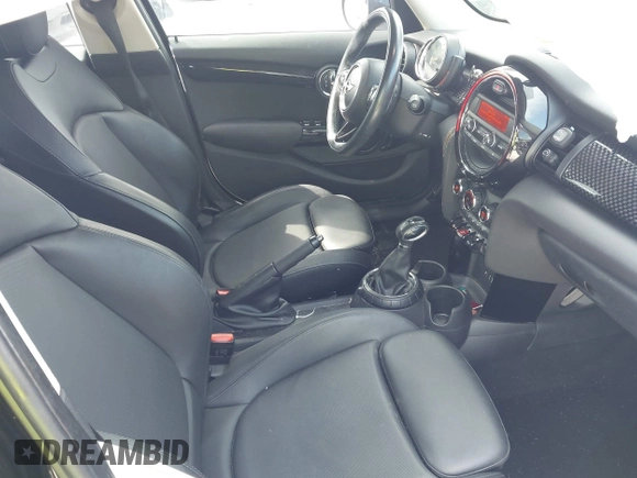 2016 MINI Hardtop 4 Door S z VIN WMWXU3C53G2D30807, wystawiony jako IAAI lot #42545577 z przebiegiem 86 952 mil mil oraz . Historia ofert i sprzedaży dostępna na DreamBid. Obrazek 5.