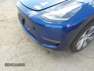 2024 Tesla Model Y Long Range z VIN 7SAYGAEE0RF074822, wystawiony jako IAAI lot #42098821 z przebiegiem Nie podano mil oraz . Historia ofert i sprzedaży dostępna na DreamBid. Obrazek 6.