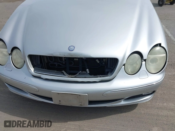 2003 Mercedes-Benz CL 5.0L with VIN WDBPJ75J23A033309, listed as a IAAI auction lot 41980289 with 174,484 mi miles. Bid and sale history available at carsss.com. Image 6.