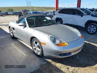 2002 Porsche Boxster z VIN WP0CA29882U622162, wystawiony jako IAAI lot #41654257 z przebiegiem 44 608 mil mil oraz . Historia ofert i sprzedaży dostępna na DreamBid. Obrazek 1.