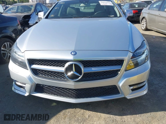 2014 Mercedes-Benz CLS 550 with VIN WDDLJ7DB0EA104042, listed as a IAAI auction lot 42643727 with 96,841 mi miles and . Bid and sale history available at DreamBid. Image 6.