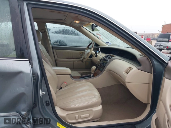 2004 Toyota Avalon XL with VIN 4T1BF28B94U387764, listed as a IAAI auction lot 42162419 with 306,611 mi miles and . Bid and sale history available at carsss.com. Image 5.