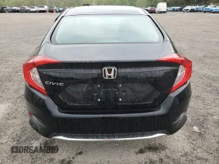 2021 Honda Civic LX z VIN 2HGFC2F6XMH502056, wystawiony jako Copart lot #54393025 z przebiegiem 57 080 mil mil oraz Czysty tytuł • Clean title. Historia ofert i sprzedaży dostępna na DreamBid. Obrazek 6.