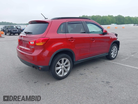 2015 Mitsubishi Outlander SE with VIN 4A4AP4AU2FE012096, listed as a IAAI auction lot 42173618 with 113,470 mi miles and . Bid and sale history available at DreamBid. Image 4.