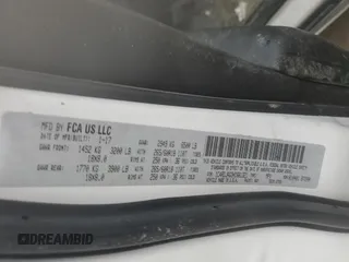 2017 Dodge Durango SXT z VIN 1C4RDJAG3HC661321, wystawiony jako Copart lot #56484865 z przebiegiem 196 047 mil mil oraz Szkoda całkowita • Salvage title. Historia ofert i sprzedaży dostępna na DreamBid. Obrazek 13.