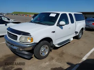 1998 Ford F-150 XL with VIN 1FTZX072XWKA12003, listed as a IAAI auction lot 41765328 with 119,445 mi miles and . Bid and sale history available at DreamBid. Image 17.