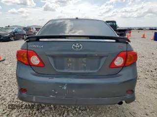 2010 Toyota Corolla z VIN 2T1BU4EE2AC497519, wystawiony jako Copart lot #64614915 z przebiegiem 183 890 mil mil oraz Szkoda całkowita • Salvage title. Historia ofert i sprzedaży dostępna na DreamBid. Obrazek 6.