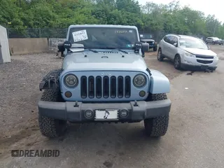2012 Jeep Wrangler Arctic with VIN 1C4GJWBG3CL172602, listed as a IAAI auction lot 42154652 with 71,470 mi miles and . Bid and sale history available at DreamBid. Image 12.