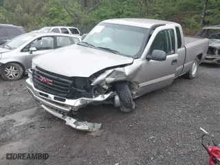 2003 GMC Sierra 1500 SLE with VIN 2GTEC19V231251709, listed as a IAAI auction lot 41973137 with 101,934 mi miles. Bid and sale history available at carsss.com. Image 2.