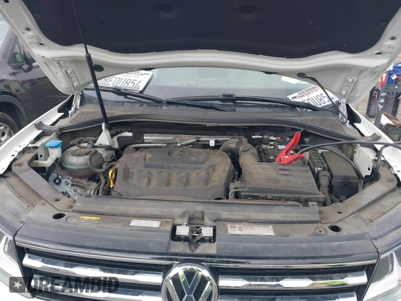 2019 Volkswagen Tiguan S with VIN 3VV1B7AX2KM039970, listed as a IAAI auction lot 41498706 with 56,907 mi miles and . Bid and sale history available at DreamBid. Image 10.