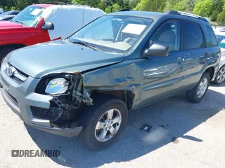2009 Kia Sportage LX with VIN KNDJF724497602223, listed as a IAAI auction lot 42085415 with 91,105 mi miles. Bid and sale history available at carsss.com. Image 2.