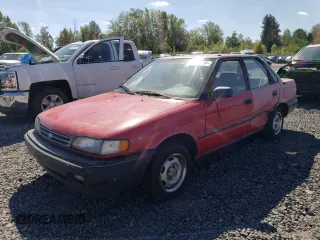 1990 Geo Prizm z VIN 1Y1SK5164LZ075024, wystawiony jako Copart lot #70294584 z przebiegiem 197 610 mil mil oraz Tytuł czysty. Historia ofert i sprzedaży dostępna na DreamBid. Obrazek 1.