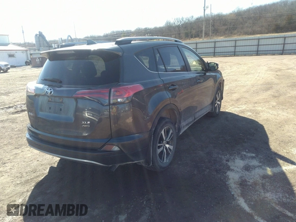 2018 Toyota RAV4 XLE with VIN JTMRFREV9JJ742276, listed as a IAAI auction lot 41855530 with 115,815 mi miles. Bid and sale history available at carsss.com. Image 4.