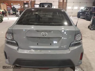 2014 Scion tC with VIN JTKJF5C72E3069294, listed as a IAAI auction lot 41291027 with 171,468 mi miles. Bid and sale history available at carsss.com. Image 16.