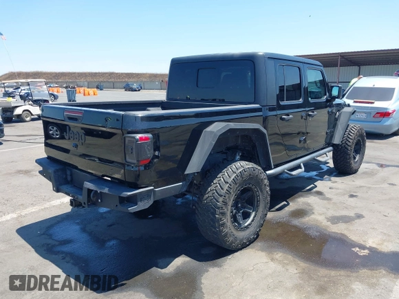 2020 Jeep Gladiator Sport S with VIN 1C6HJTAGXLL123540, listed as a IAAI auction lot 42453999 with 27,855 mi miles and . Bid and sale history available at DreamBid. Image 4.