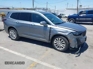 2021 Cadillac XT6 Premium Luxury with VIN 1GYKPERS7MZ111033, listed as a IAAI auction lot 42686174 with 51,272 mi miles and . Bid and sale history available at DreamBid. Image 1.