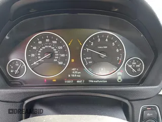 2014 BMW 4 Series 428i with VIN WBA3N7C5XEF719384, listed as a IAAI auction lot 41694678 with 115,517 mi miles and . Bid and sale history available at carsss.com. Image 7.