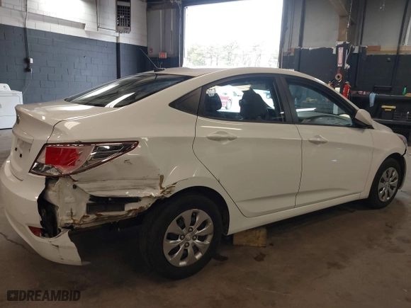 2015 Hyundai Accent GLS with VIN KMHCT4AE8FU876771, listed as a IAAI auction lot 42007229 with 63,484 mi miles. Bid and sale history available at carsss.com. Image 6.