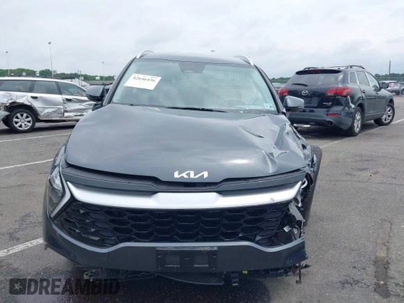 2023 Kia Sportage EX with VIN KNDPVCAG1P7110909, listed as a IAAI auction lot 42646436 with 16,304 mi miles and . Bid and sale history available at DreamBid. Image 12.