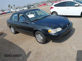 2000 Toyota Corolla VE with VIN 1NXBR12E8YZ321975, listed as a IAAI auction lot 42542998 with 133,033 mi miles and . Bid and sale history available at DreamBid. Image 1.