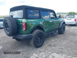 2023 Ford Bronco with VIN 1FMEE5DP0PLB80676, listed as a IAAI auction lot 42210054 with 6,796 mi miles and . Bid and sale history available at DreamBid. Image 4.