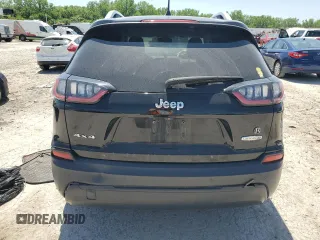 2019 Jeep Cherokee Latitude Plus z VIN 1C4PJMLBXKD409716, wystawiony jako Copart lot #56367955 z przebiegiem 53 831 mil mil oraz Szkoda całkowita • Salvage title. Historia ofert i sprzedaży dostępna na DreamBid. Obrazek 6.