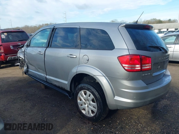 2015 Dodge Journey SE z VIN 3C4PDCAB3FT641675, wystawiony jako IAAI lot #41898611 z przebiegiem 218 121 mil mil oraz . Historia ofert i sprzedaży dostępna na DreamBid. Obrazek 3.