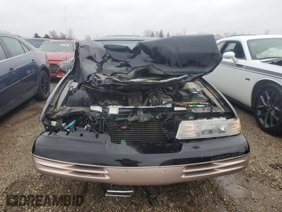 1995 Mercury Cougar z VIN 1MELM62W3SH605641, wystawiony jako Copart lot #84732824 z przebiegiem 40 675 mil mil oraz Szkody całkowita. Historia ofert i sprzedaży dostępna na DreamBid. Obrazek 5.