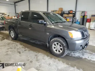 2004 Nissan Titan LE with VIN 1N6AA07B74N507976, listed as a Copart auction lot 56402785 with 181,253 mi miles and Salvage title. Bid and sale history available at DreamBid. Image 4.