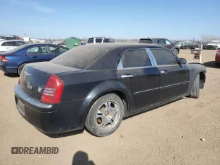 2005 Chrysler 300 with VIN 2C3JA63H15H654003, listed as a Copart auction lot 48752465 with 103,090 mi miles and Salvage Title. Bid and sale history available at carsss.com. Image 3.
