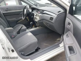 2004 Mitsubishi Lancer ES with VIN JA3AJ26E74U060371, listed as a IAAI auction lot 41636927 with 165,456 mi miles. Bid and sale history available at carsss.com. Image 5.
