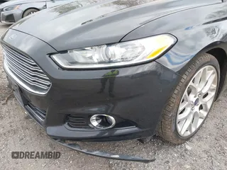2014 Ford Fusion Titanium with VIN 3FA6P0K92ER355539, listed as a IAAI auction lot 41851471 with 178,176 mi miles and . Bid and sale history available at DreamBid. Image 15.